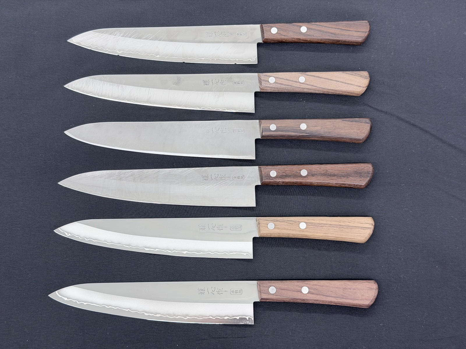The same knife sharpened by 5 Kappabashi shops, compared side by side