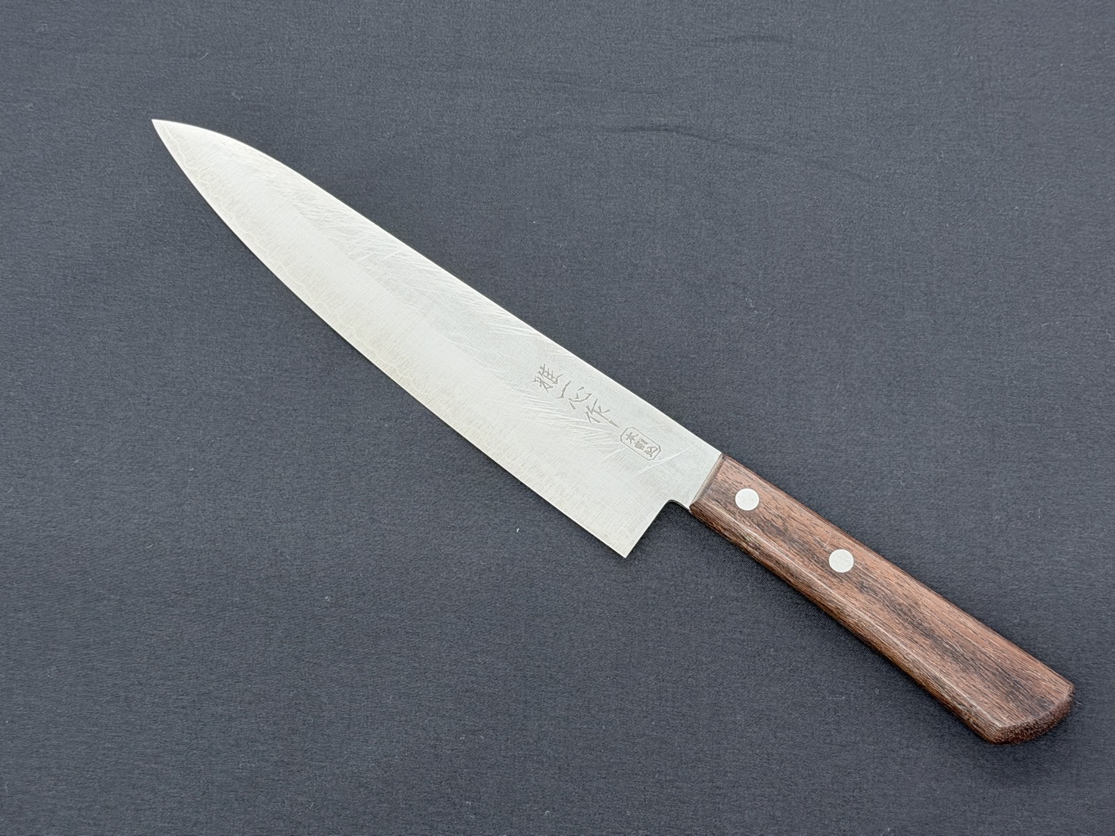 A santoku carefully sharpened at Kamata Hakensha with the thorough, pro-grade work of a dedicated sharpening specialist