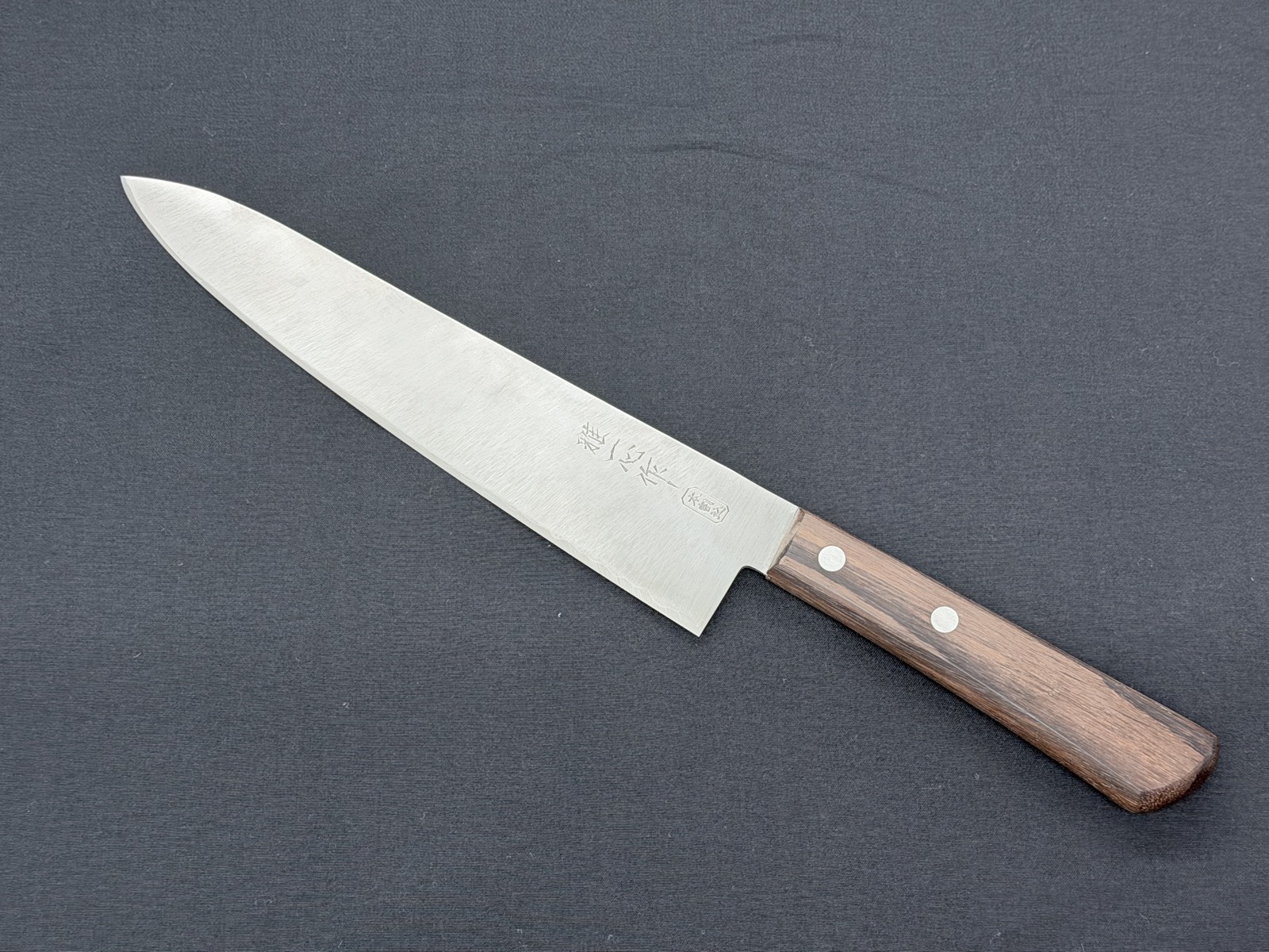 A santoku sharpened on the spot at Seisuke, with the edge firmly restored to full sharpness